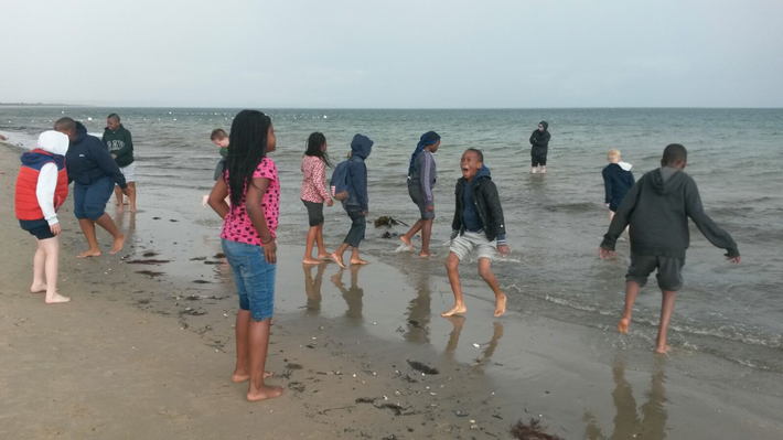 Enjoying the sea on Yr6 school journey to Swanage